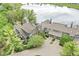 Beautiful lakefront townhomes with lush landscaping and attached garages, showcasing scenic community views at 7786 Harbour Isle, Indianapolis, IN 46240