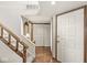 The foyer has classic parquet flooring and coat closet, offering a warm greeting upon entry at 7786 Harbour Isle, Indianapolis, IN 46240