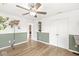 Comfortable bedroom with hardwood floors, neutral tones, and closet at 7829 Hedgehop Dr, Zionsville, IN 46077
