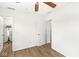 Simple bedroom with hardwood floors, neutral walls, and ample closet space at 7829 Hedgehop Dr, Zionsville, IN 46077
