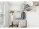 Walk-in closet with shelving, hanging racks, and natural light at 7829 Hedgehop Dr, Zionsville, IN 46077