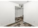 Finished basement hallway featuring neutral walls and a multi-tone block carpet pattern at 7829 Hedgehop Dr, Zionsville, IN 46077