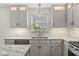 Gourmet kitchen with granite countertops, stainless appliances, and ample cabinet space at 7829 Hedgehop Dr, Zionsville, IN 46077