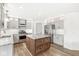 Stylish kitchen with granite counters, stainless appliances, and a center island at 7829 Hedgehop Dr, Zionsville, IN 46077