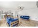 Open-concept living area seamlessly flows into the dining and kitchen space offering ample room at 7829 Hedgehop Dr, Zionsville, IN 46077