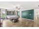 Spacious main bedroom with a ceiling fan, stylish decor, and plenty of natural light at 7829 Hedgehop Dr, Zionsville, IN 46077