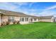 Spacious backyard with green lawn, ideal for outdoor activities and relaxing afternoons at 793 Shepherds Way, Greenwood, IN 46143