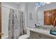 Charming bathroom featuring a shower-tub combo, marble countertop, and stylish vanity at 793 Shepherds Way, Greenwood, IN 46143
