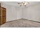 Neutral bedroom featuring carpet flooring, ceiling fan, and wood trim at 793 Shepherds Way, Greenwood, IN 46143