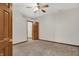 Neutral bedroom with carpet flooring, ceiling fan, and a doorway to a closet at 793 Shepherds Way, Greenwood, IN 46143
