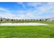 Community pond offering a scenic backyard view with lush lawn space and tranquil views for residents to enjoy at 793 Shepherds Way, Greenwood, IN 46143