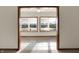 Sitting area with tile flooring, view of lake, and two windows for lots of natural light at 793 Shepherds Way, Greenwood, IN 46143