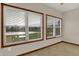 Sitting area with tile floors and view of the lake at 793 Shepherds Way, Greenwood, IN 46143