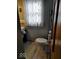 The powder room features updated wood-look flooring and is ready for move-in at 798 S 600 W, New Palestine, IN 46163