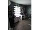 This bedroom provides natural light and space with an adjacent desk area at 798 S 600 W, New Palestine, IN 46163