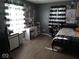 Cozy bedroom with ample natural light, a vanity, and stylish decor at 798 S 600 W, New Palestine, IN 46163