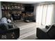 Spacious living room boasting a stone fireplace, hardwood floors, and plenty of natural light at 798 S 600 W, New Palestine, IN 46163