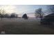 View of a foggy front yard and surrounding trees at 798 S 600 W, New Palestine, IN 46163