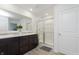 Clean bathroom with double vanity and glass-door shower at 813 Sonoma Ln, Greenfield, IN 46140
