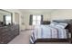 Inviting bedroom features plush carpeting and ample natural light at 813 Sonoma Ln, Greenfield, IN 46140