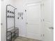 Bright hallway with functional coat rack and bench at 813 Sonoma Ln, Greenfield, IN 46140