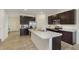 Well-equipped kitchen with stainless steel appliances, island, and ample counter space at 813 Sonoma Ln, Greenfield, IN 46140
