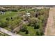 Stunning aerial perspective of an estate with sprawling lawns, mature trees, and a luxurious home nestled within at 8551 E 300 S, Zionsville, IN 46077