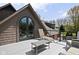 Charming balcony with lounge chairs and table overlooks a scenic view, creating an outdoor retreat at 8551 E 300 S, Zionsville, IN 46077