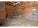 Barn interior with hay, wood walls, and a fan for ventilation at 8551 E 300 S, Zionsville, IN 46077