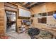 Barn interior featuring wood walls, storage cabinets, and tools and hay at 8551 E 300 S, Zionsville, IN 46077