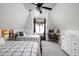 Comfortable upstairs bedroom featuring two twin beds, a desk area, and natural light for a cozy, versatile space at 8551 E 300 S, Zionsville, IN 46077