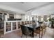 Open dining and kitchen area with a spacious table, stylish chairs, and view into living space at 8551 E 300 S, Zionsville, IN 46077