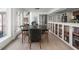 Open dining area with a large table, hardwood floors, and ample natural light at 8551 E 300 S, Zionsville, IN 46077