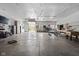 Spacious garage with room for ping pong, foosball, and basketball, perfect for recreation and hobbies at 8551 E 300 S, Zionsville, IN 46077