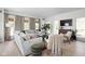 Comfortable living room with a large sectional, natural light, and stylish decor at 8551 E 300 S, Zionsville, IN 46077