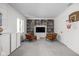Inviting living room with custom bookshelves, modern furnishings, and a cozy ambiance at 8551 E 300 S, Zionsville, IN 46077