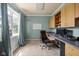 Functional office space featuring a built-in desk, storage, and a bright window, perfect for productivity at 8551 E 300 S, Zionsville, IN 46077