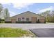 Large outbuilding with multiple garage doors and a basketball hoop, offering ample storage and recreation space at 8551 E 300 S, Zionsville, IN 46077