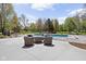 Inviting outdoor pool area with patio seating and ample space for lounging, promising relaxation and recreation at 8551 E 300 S, Zionsville, IN 46077