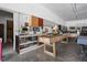 Spacious rec room with a kitchenette and various game tables, creating a fun and versatile area at 8551 E 300 S, Zionsville, IN 46077