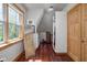 Well-organized walk-in closet with hardwood floors, natural light, and custom shelving, providing ample storage at 8551 E 300 S, Zionsville, IN 46077