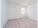 Well-lit bedroom with a window featuring shutters, offering a bright and airy space at 8654 Tripp Rd, Pendleton, IN 46064