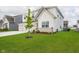 Two-story house with an attached three-car garage and landscaped front yard at 8654 Tripp Rd, Pendleton, IN 46064