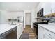 Kitchen featuring stainless steel appliances, a center island, and a modern backsplash at 8654 Tripp Rd, Pendleton, IN 46064