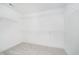 Spacious walk-in closet with white shelving units, offering ample storage space at 8654 Tripp Rd, Pendleton, IN 46064