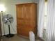 Bedroom displaying wooden wardrobe with adjacent window, along with a fan at 9045 Stones Bluff Pl, Indianapolis, IN 46113
