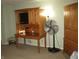 Office space featuring a wooden desk with hutch and a fan nearby at 9045 Stones Bluff Pl, Indianapolis, IN 46113