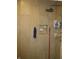 Shower equipped with modern fixtures and shelving for storage at 9045 Stones Bluff Pl, Indianapolis, IN 46113