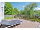 Outdoor back deck with wood railing and room to relax and enjoy the yard at 9099 Merrill Ct, Fishers, IN 46038