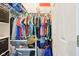 A well-organized closet features ample hanging space and shelving for efficient storage of clothing and accessories at 9099 Merrill Ct, Fishers, IN 46038